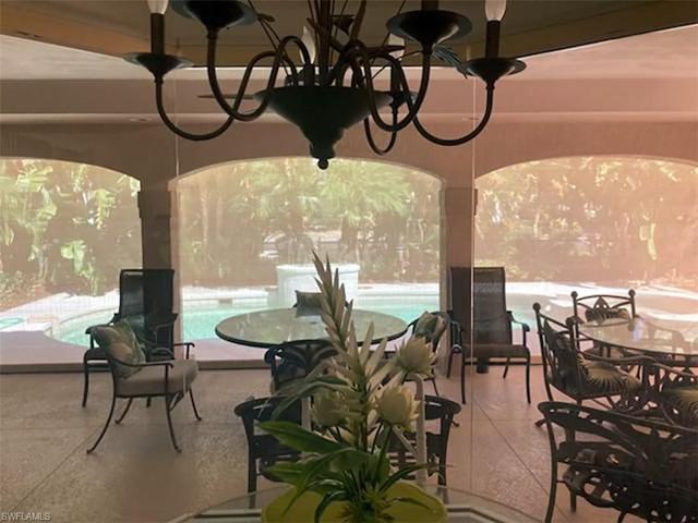 Pre hurricane outdoor lanai with drop screens