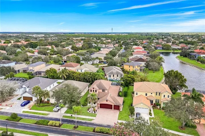 Aerial view of residential area with a nearby body of water