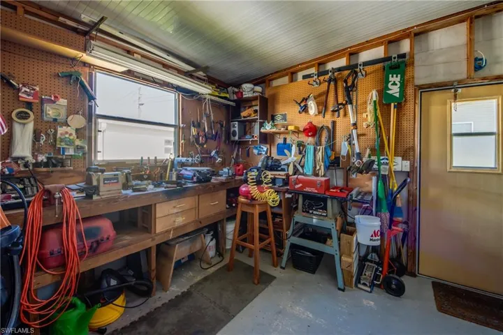 Garage featuring a workshop area