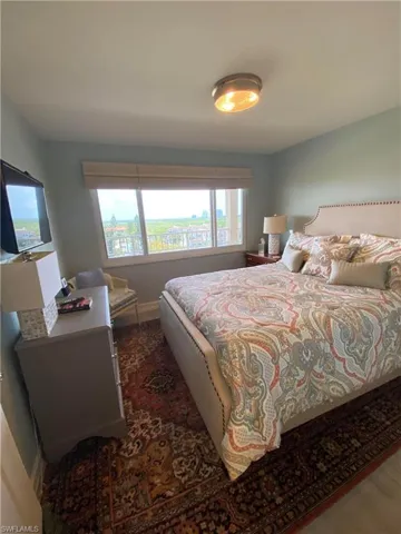 Bedroom featuring dark hardwood / wood-style floors