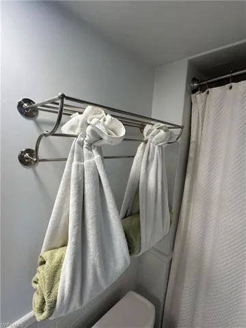 Bathroom with a shower with curtain