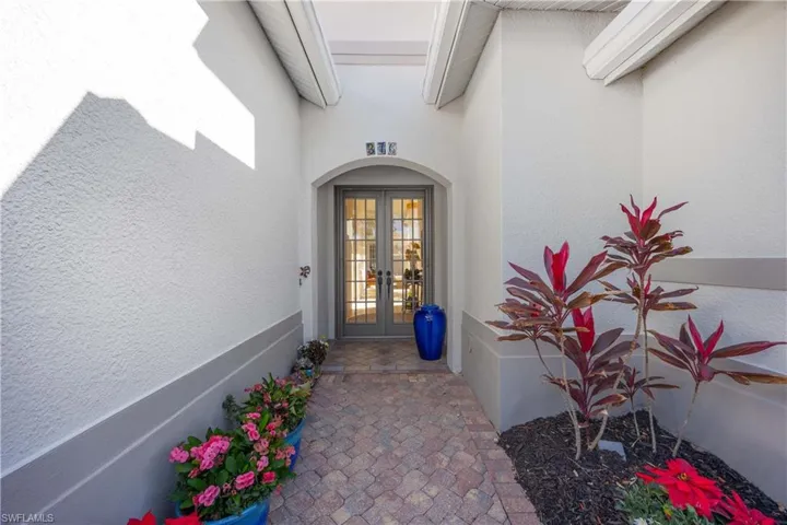 Entrance to property featuring french doors