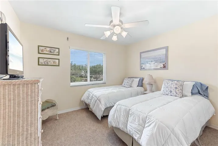 Bedroom with carpet floors and ceiling fan