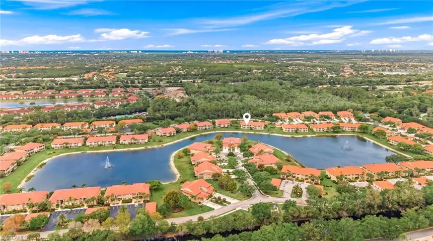 Aerial view of residential area with a large body of water