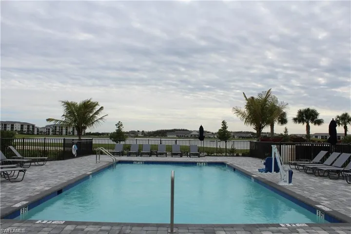 Satellite Community pool featuring a patio area