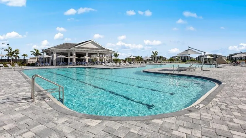 Community pool featuring a patio area