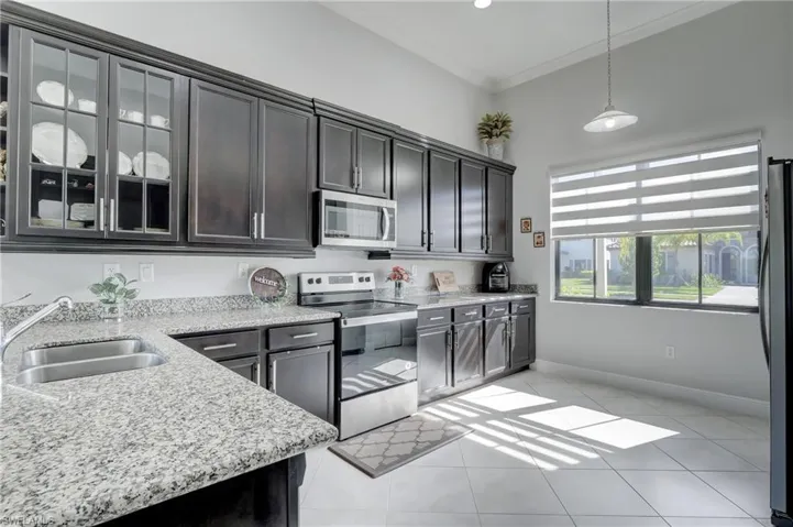 Beautifully appointed contemporary kitchen. Room for table by the window!