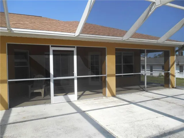 Back of property with a patio area