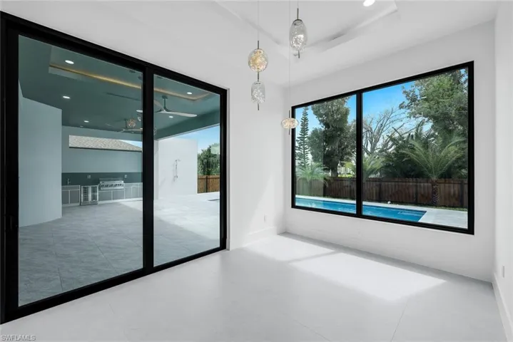 Spare room with healthy amount of natural light and recessed lighting