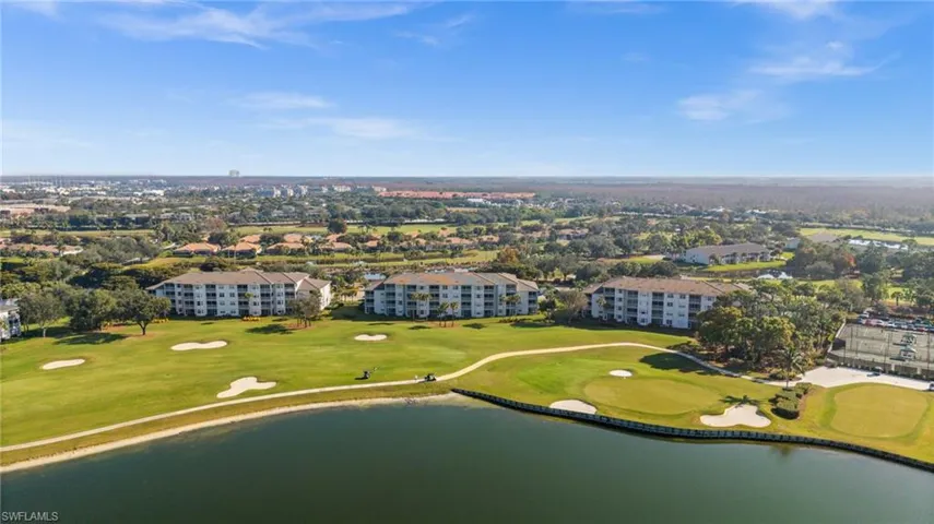 Aerial view of a local golf course and a large body of water