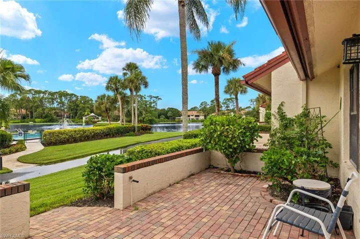 View of patio / terrace featuring a water view