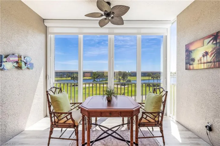 Wide open view of golf course and lakes from your lanai. Impact doors for year round living.