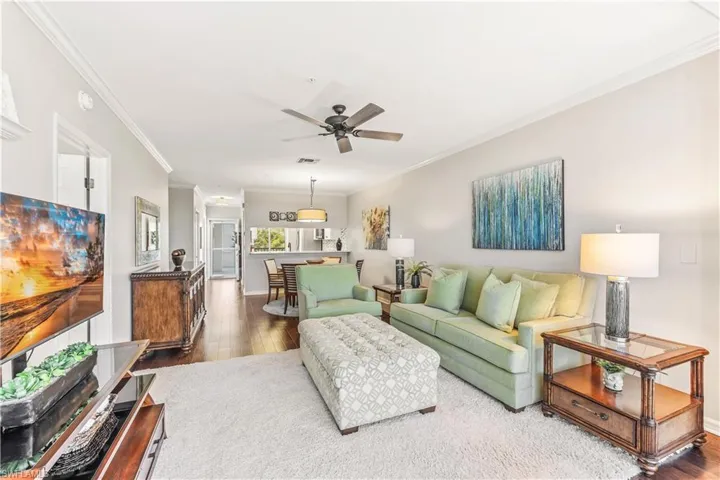 Sold fully furnished with high end Tommh Bahama style furnishings. Crown molding. Hand scraped wood floors.