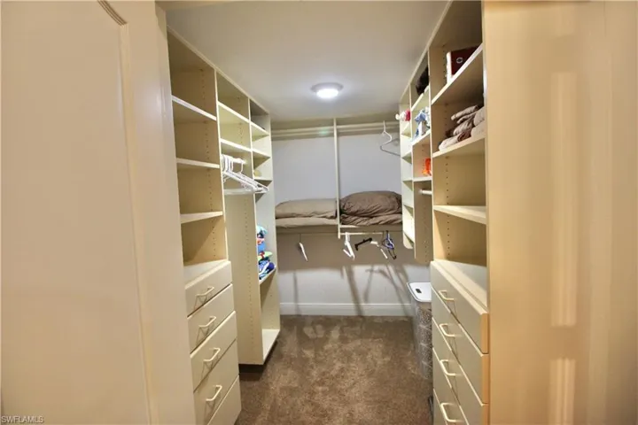 Custom walk in closet off of master bedroom