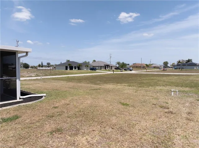 View of yard with a residential view