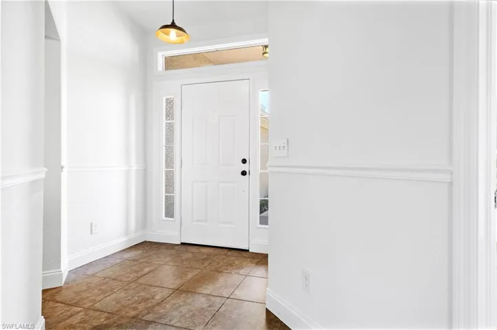 Entrance foyer with baseboards
