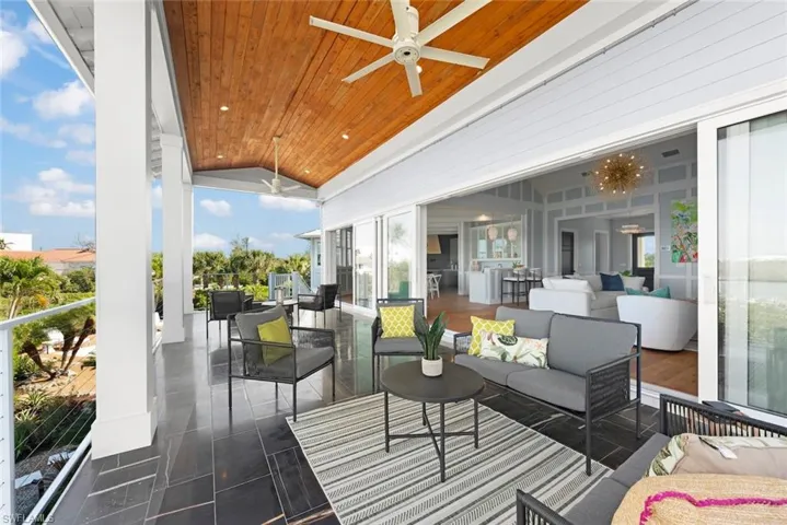 Covered Deck opens to Living Room.