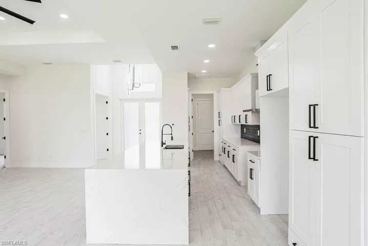 Unfurnished room featuring light wood-type flooring