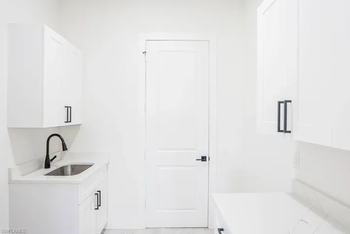 Unfurnished bedroom featuring light wood-type flooring and ceiling fan
