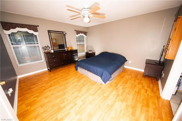 Master Bedroom featuring ceiling fan and light hardwood / wood-style flooring