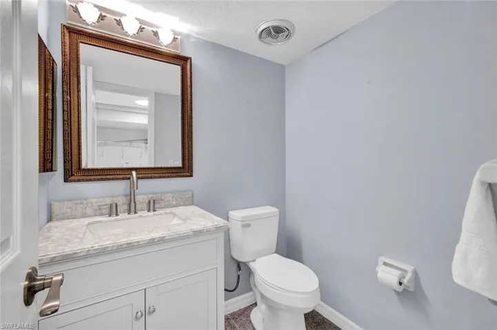 Bathroom featuring toilet and vanity