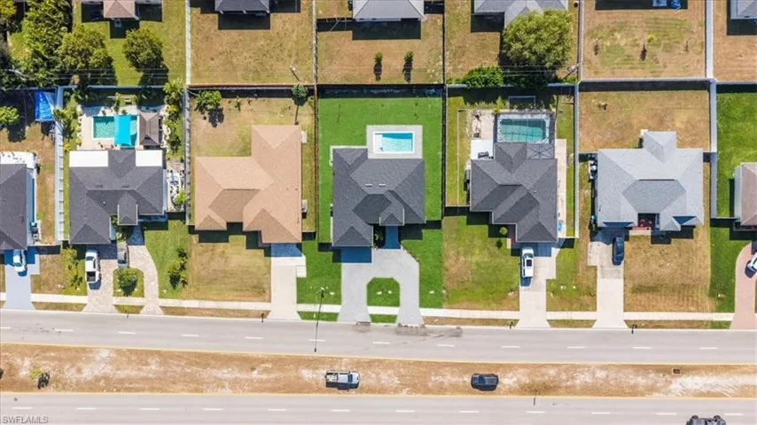Aerial view of residential area with a pool area