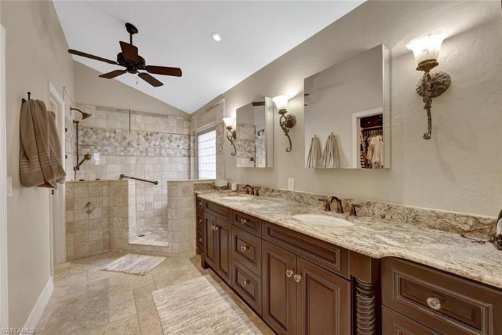 Primary bath with walk in shower and walk in closet.