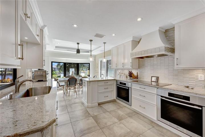 Elegance meets comfort at 9815 Leeward Ct.