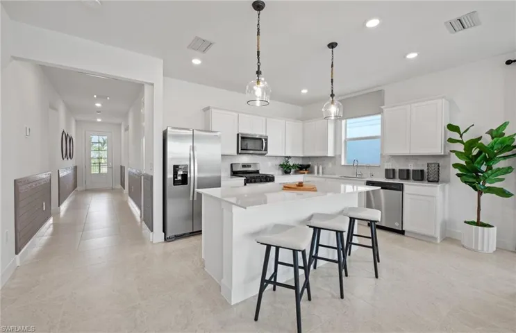 Interior photos are of a staged model home. Illustration purposes only.