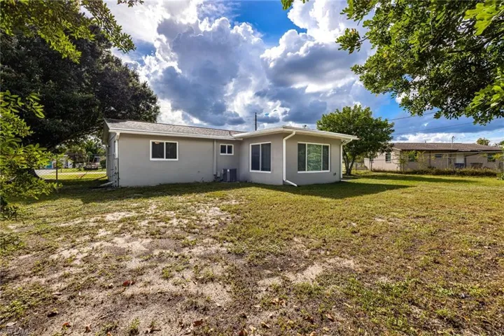 809  Palm  BLVD, Lehigh Acres, FL 33936
