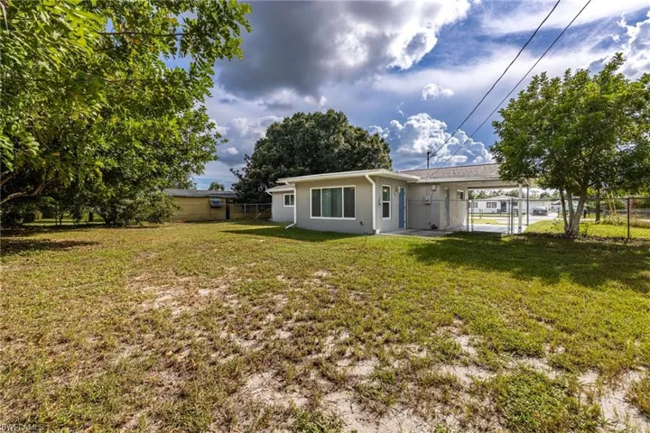 809  Palm  BLVD, Lehigh Acres, FL 33936