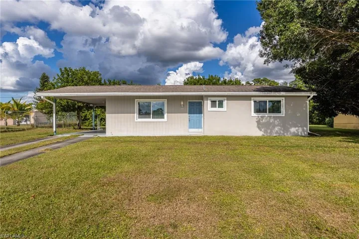 809  Palm  BLVD, Lehigh Acres, FL 33936