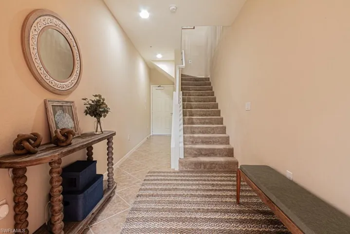 Foyer with StaircaseFront & garage entry + storage room.