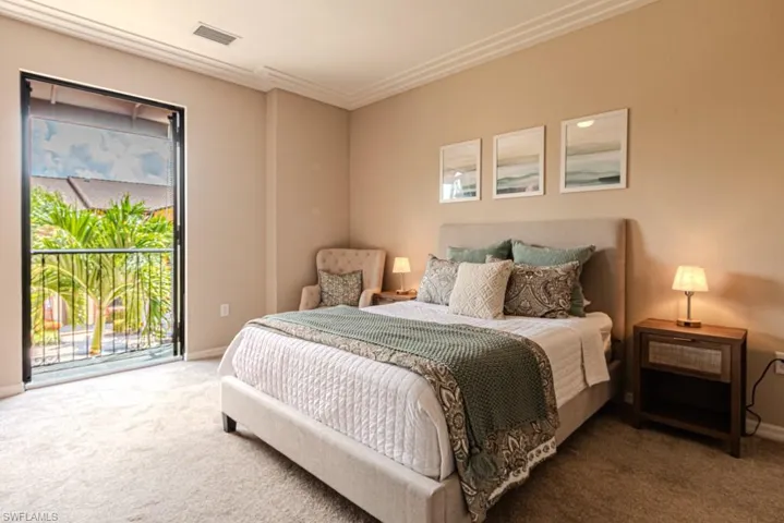 French doors open to Juliet balcony