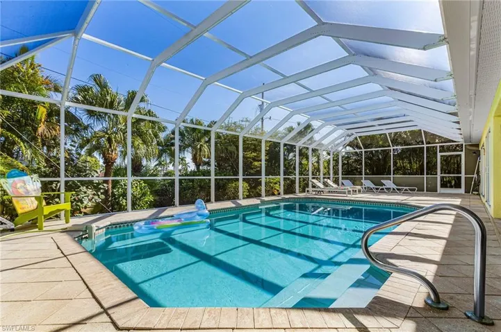 Pool with extended Deck from one side to the other side of the home.