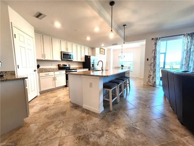 Kitchen with island and walk in pantry