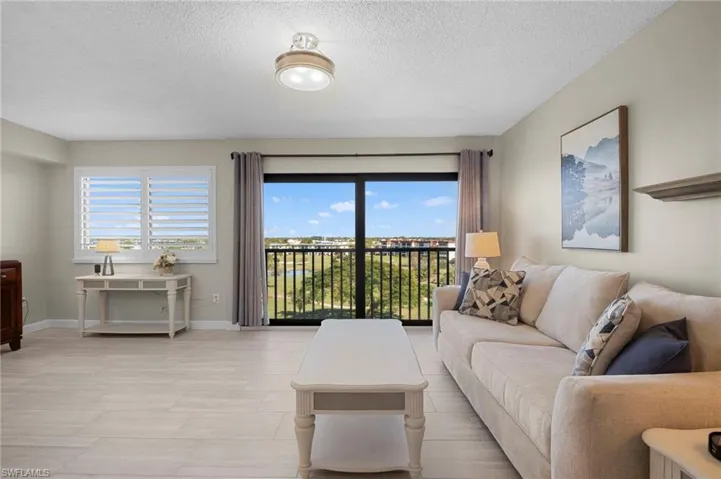 Main Living Area with magnificent views of lakes and golf course