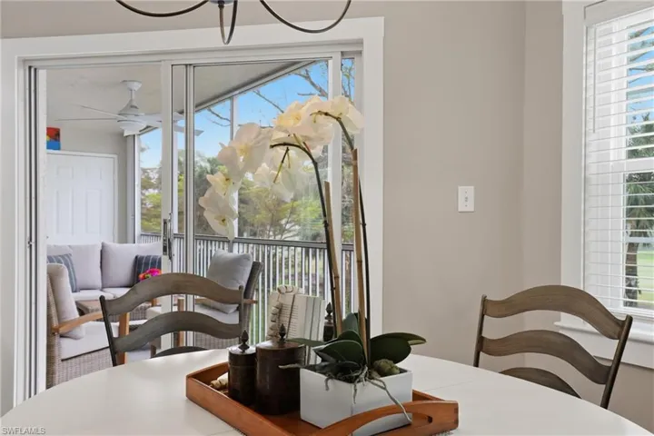 Dining room featuring healthy amount of natural light and a ceiling fan