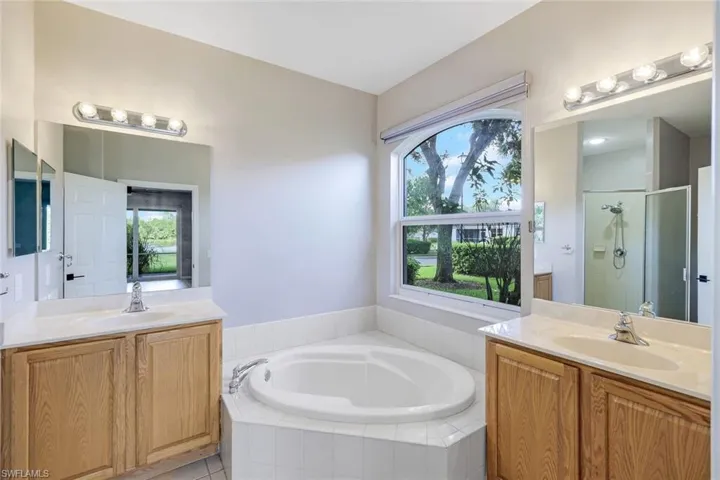Dual Vanities, garden tub with natural light
