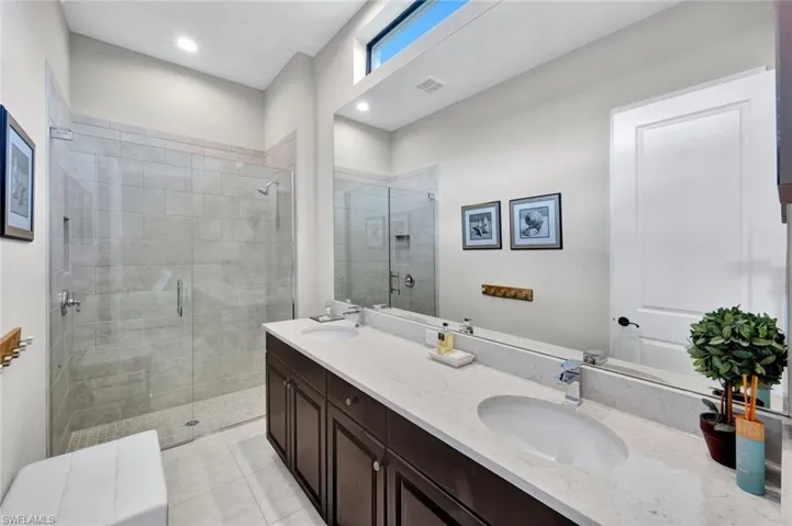 Guest Bathroom with pocket door to guest bedroom and next to your Bonus Room for the Fun
