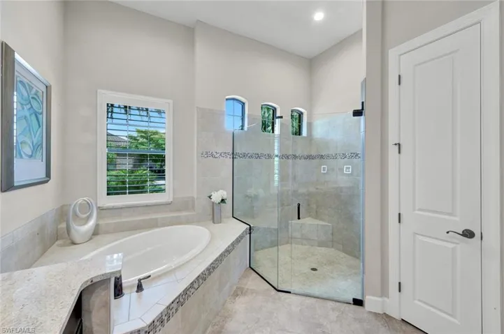 Primary Bathroom with a linen closet