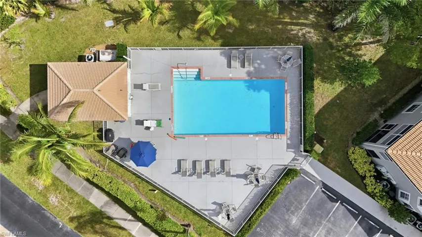 View from above of property with a pool area