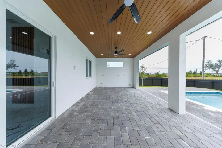 View of patio with ceiling fan
