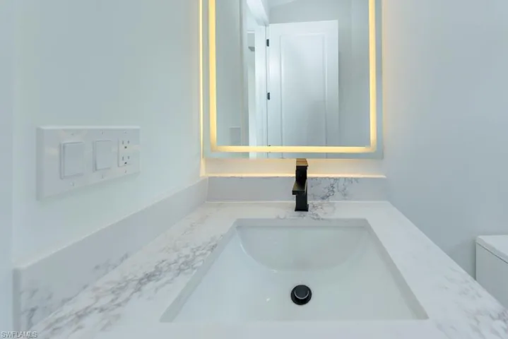 Bathroom view of vanity and toilet