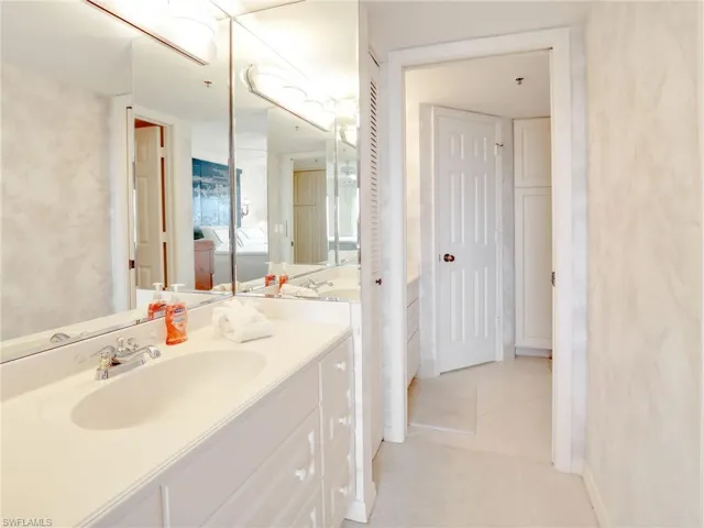 Bathroom with vanity and tile patterned floors