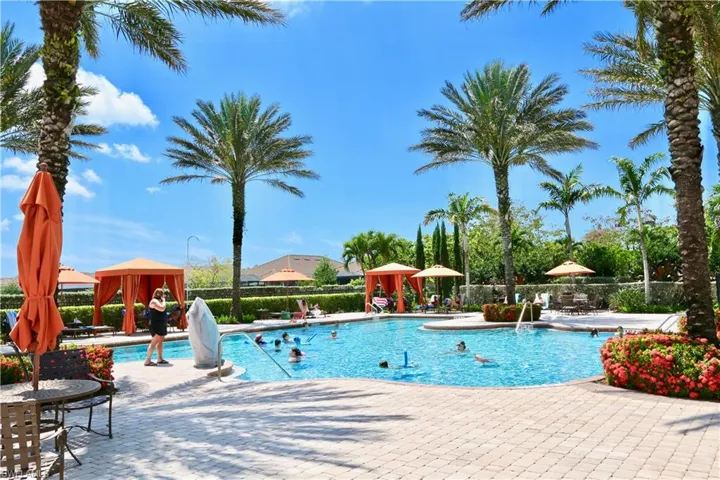 Community pool with a gazebo and a patio area