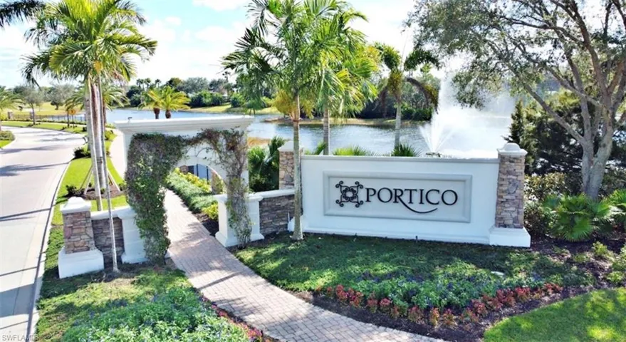 Community sign featuring a water view