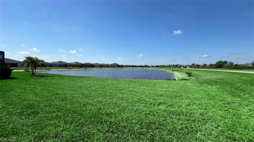 Water view featuring nearby suburban area