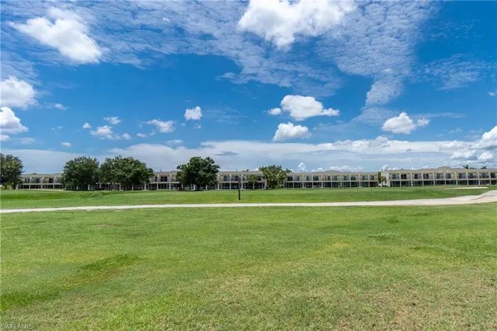 Surrounding community featuring a lawn