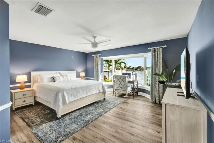 The primary suite with incredible lake views